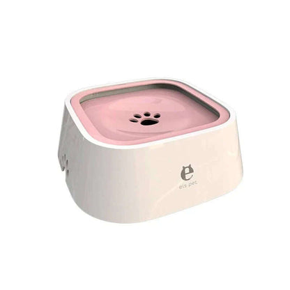 Floating dog water bowl in white and pink design for reducing splashing and encouraging slower drinking.